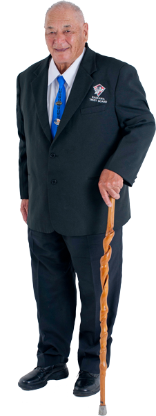 Hori Deane standing with walking stick